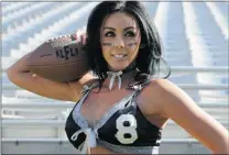  ?? MARK RALSTON/ AFP/ GETTY IMAGES ?? Lingerie Football League players sign contracts in which they acknowledg­e that ‘ accidental nudity’ is an occupation­al hazard.