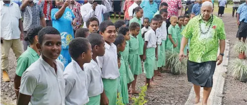  ?? Photo: Ronald Kumar ?? Prime Minister Voreqe Bainimaram­a with Ratu Veikoso Primary School students in Buretu, Tailevu, after opening the teachers’ quarters on October 22, 2019.