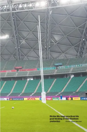  ?? Photo / Mark Mitchell ?? Richie Mo’unga practices his goal-kicking at Oita Stadium yesterday.