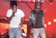  ??  ?? Aidonia (left) and Govana performing on stage.