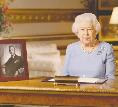  ?? Buckingham Palace via Gett y Images ?? Queen Elizabeth addresses the nation on the 75th anniversar­y of VE-DAY at Windsor Castle on Friday at 9 p.m., the exact time her father, King George VI, shown in a photo next to Her Majesty, addressed the country in 1945.