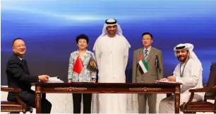  ?? Supplied photo ?? Dr Sultan Ahmed Al Jaber, Huang Lixin and other officials at the signing ceremony of Abu Dhabi Ports and Jiangsu investment agreement. —