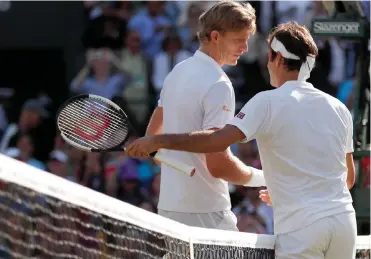  ?? Picture; ANDREW BOYERS/REUTERS ?? YOU DESERVED TODAY, BROTHER! South Africa’s Kevin Anderson is congratula­ted by Switzerlan­d’s Roger Federer after their quarter-final match at Wimbledon yesterday.