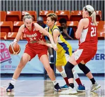  ??  ?? Move it: Segamat’s Demi Skinner (left) trying to dribble past a Matrix player in the final match at the Maba Stadium yesterday.