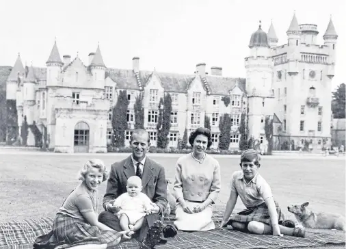  ??  ?? HAPPY HOLIDAYS: The Queen and Prince Philip with Princess Anne, Prince Charles and baby Prince Andrew at Balmoral on Deeside