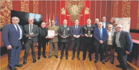  ?? // ABC ?? Premiados por la Junta de Cofradías en la presentaci­ón de la Semana Santa de Toledo