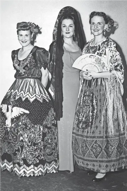  ?? THE COMMERCIAL APPEAL FILES ?? Fiesta finery was in fashion at Trinity Methodist Church in October 1951. Among more than a score who dressed up to bring life to a study of Latin American missions were Mrs. W.K. Bradley (Left) of 1765 Crump; Mrs. Turner Morehead Jr. (Center) of 53 East Norwood and Mrs. Kenneth E. McRae Jr. of 2854 Spottswood. Sponsor was the Woman's Society of Christian Service.