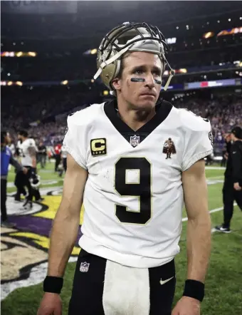  ?? AP FILe GeTTy IMaGes FILe ?? TONE-DEAF: Drew Brees’ comments on protesting miss the point.
LOOKING BACK: Colin Kaepernick was made a pariah for kneeling during the national anthem.