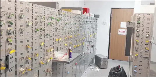  ?? Brian Shapiro ?? Safe deposit boxes are seen at 24/7 Private Vaults after the company filed for bankruptcy in early 2014. U.S. Bankruptcy Court Trustee Brian Shapiro was in the process of drilling open boxes to inventory their contents.