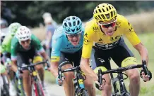  ?? CHRIS GRAYTHEN/GETTY IMAGES ?? Chris Froome of Britain headed into Monday’s Tour de France rest day with an 18-second edge on Fabio Aru.