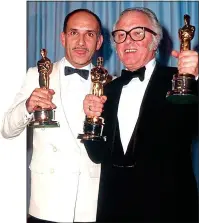  ??  ?? ACCLAIM: Attenborou­gh and Ben Kingsley, who played Gandhi, celebratin­g their Oscars