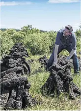  ?? PHOTO: ANDREW DOWNES ?? Under threat: Peat and turf has been a source of work in the midlands for generation­s but jobs in Bord na Móna are now threatened.