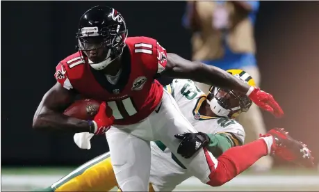  ?? File, John Bazemore / The Associated Press ?? Atlanta Falcons wide receiver Julio Jones (11) has been sidelined since injuring his hip in Week 4 against the Buffalo Bills.