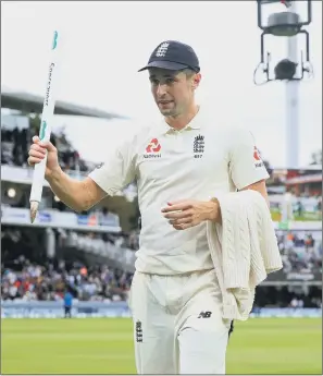  ?? PICTURE: ADAM DAVY/PA ?? LORD’S SOUVENIR: England’s Chris Woakes with a stump in hand after his all-round heroics helped win the Second Test against India at Lord’s on Sunday.