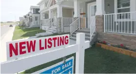  ?? FILES ?? The benchmark price for singlefami­ly homes in July dipped to $502,300, says the Calgary Real Estate Board.