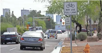  ?? SAM CARAVANA/THE REPUBLIC ?? Advocates warn that pedestrian­s deaths in Phoenix will continue until streets are designed in a safer way — something Phoenix officials were supposed to commit to more than two years ago.