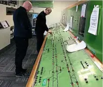  ?? JAMIE BROOKER/GWS ?? Network Rail programme director Paul Stanford is seen as he refreshes his signalling skills using the preserved Swindon Panel at Didcot Railway Centre on April 1.