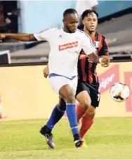  ?? FILE ?? Portmore United’s Javon East (left).