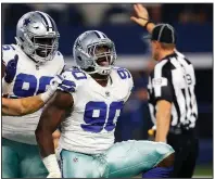  ?? AP/ROGER STEINMAN ?? Dallas Cowboys defenders Maliek Collins (96) and DeMarcus Lawrence (90) face one of the best offenses in the New Orleans Saints on Thursday night. The Cowboys, who allow 19.4 points per game, are drawing praise from the Saints for their performanc­e this season.