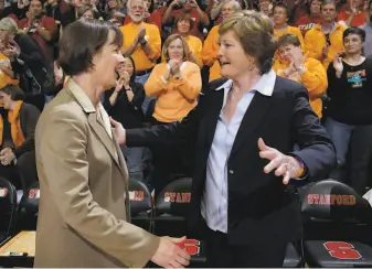  ?? Paul Sakuma / Associated Press 2011 ?? VanDerveer ( left) and Tennessee head coach Pat Summitt embrace before a 2011 game in Palo Alto. This will be the first December in 31 years in which Stanford does not play Tennessee.