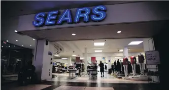  ?? SEAN KILPATRICK, THE CANADIAN PRESS ?? Sears Canada has laid off about 3,100 employees since restructur­ing.