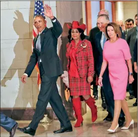  ?? AP/PABLO MARTINEZ MONSIVAIS ?? President Barack Obama arrives Wednesday at the Capitol for a meeting with House and Senate Democratic leaders, including Rep. Frederica Wilson of Florida (center), Senate Minority Leader Charles Schumer and House Minority Leader Nancy Pelosi.
