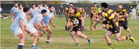  ?? ?? Foxton captain Pieta Marshall on the charge passes to team mate Mike Laursen.