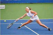  ?? AP ?? Svetlana Kuznetsova lunges for the ball against Donna Vekic during the final at the Citi Open in Washington.