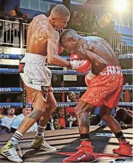  ?? SUPPLIED ?? Ludumo Lamati digs an uppercut against Haidari Mchanjo. /