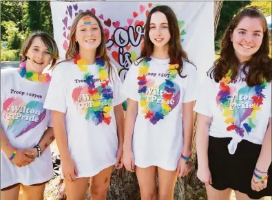  ?? Jarret Liotta / For Hearst Connecticu­t Media ?? Four community-minded Girl Scouts from Troop #50798 include, from left, Annabelle Shultz, 12, Charlotte Halliwell, 13, McKenna Rooney, 13, and Reagan Hurley, 12, who organized Thursday's Pride event as part of their Silver Award work.