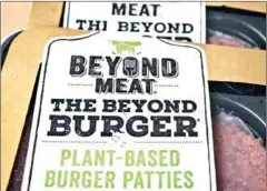  ?? DREW ANGERER/GETTY IMAGES/AFP ?? Packages of Beyond Meat ‘The Beyond Burger’ sit on a table in the Brooklyn borough of New York City.