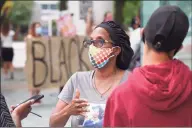  ?? Matthew Brown / Hearst Connecticu­t Media ?? Valerie Jaddo, mother of Steven Barrier, speaks out as a group of protesters calling for police reform and change rally in front of the Stamford Government Center on July, 17.