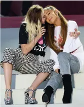  ?? —AFP, AP ?? (Clockwise from above) Singers Ariana Grande (right) and Miley Cyrus; musician Robbie Williams and Chris Martin perform at the One Love Manchester benefit concert for families of the victims of the May 22 Manchester terror attack at Emirates Old...