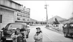  ??  ?? This photo taken on Jan 16 shows villagers who live next to the abandoned Alps Ski Resort, a former holiday destinatio­n in South Korea’s far northeast close to the Demilitari­zed Zone that divides the peninsula, near Sokcho.