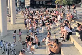  ??  ?? Crowds in Roald Dahl Plass in Cardiff Bay on Friday night