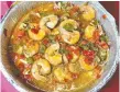  ?? PHOTOS PETER HUM ?? Shrimp Escabeche is a Filipino version of sweet-and-sour shrimp, with peppers, pineapple, onions and ginger.