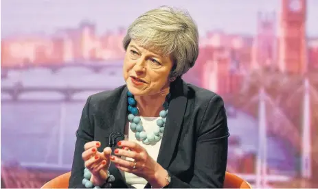 ?? /Reuters ?? Appeal: UK Prime Minister Theresa May appears on BBC TV’s The Andrew Marr Show in London last week.. Opponents of the EU seek greater distance from the bloc than envisaged in her deal, while pro-Europeans are pushing for a second referendum.