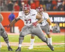  ?? Getty Images ?? Offensive lineman Jaelin Robinson (77) and Temple face UConn on Saturday at Rentschler Field.