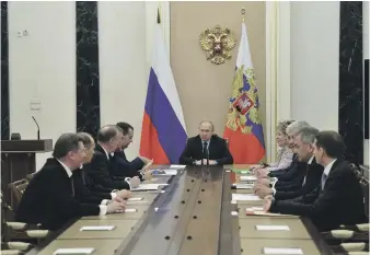  ?? AFP ?? Russian President Vladimir Putin chairs a meeting with permanent members of the Security Council in Moscow yesterday