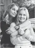  ?? ORION PICTURES ?? Debby Ryan, left, and Angourie Rice hug it out in Every Day, a teen fantasy, whose cast and a solid script save it from a cutesy and complicate­d premise.