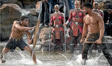  ??  ?? Chadwick Boseman and Michael B Jordan square up in Black Panther.