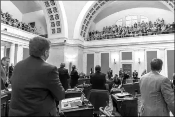  ?? CRAIG HUDSON / CHARLESTON GAZETTE-MAIL VIA AP ?? State senators acknowledg­e the cheers of teachers and school personnel March 6 after the passage of a bill to increase pay of state employee by 5 percent in Charleston, W.Va.