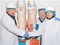  ??  ?? Winners of the champion and reserve North Country Cheviot were brothers Alex and John Paul, of JW Paul & Sons, Ballingall Mill Farm, Leslie, Glenrothes. They are seen with judge Jacques Guilbaud, right.