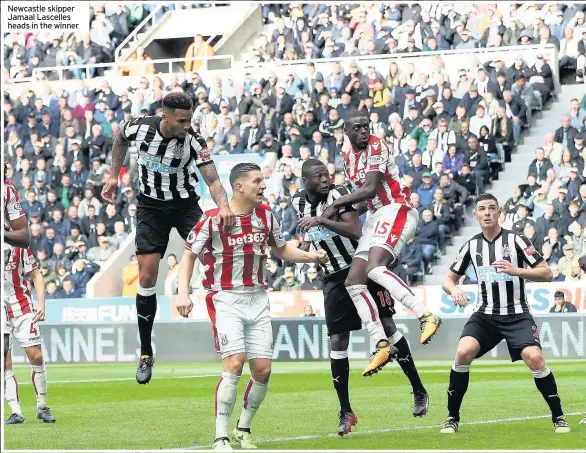  ??  ?? Newcastle skipper Jamaal Lascelles heads in the winner