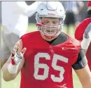  ?? DAVID JABLONSKI ?? Fifth-year senior Pat Elflein, a Pickeringt­on native, started all 28 games the last two seasons at guard but said he’s comfortabl­e moving to center. COLLEGE FOOTBALL