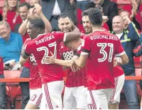  ??  ?? ■ Daryl Murphy (centre) celebrates his goal.