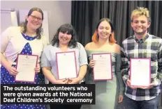  ??  ?? The outstandin­g volunteers who were given awards at the National Deaf Children’s Society ceremony