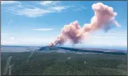  ?? AP/U.S. Geological Survey ?? Hawaii’s Kilauea volcano, which erupted Thursday, continued to spurt lava and smoke Friday.