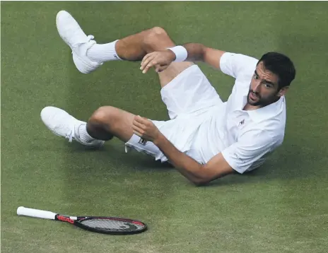  ??  ?? Marin Cilic, last year’s beaten finalist at Wimbledon, lost in five sets to Guido Pella in the second round on Thursday Reuters
