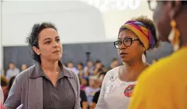  ?? (AFP) ?? Candidates for the governorsh­ip of the State of Rio de Janeiro talk with each other minutes before the start of a debate between them, at the Bela Mare Cultural Centre, in Rio de Janeiro on September 18